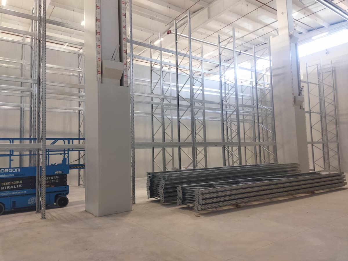 Galvanised racking in a panel-clad warehouse